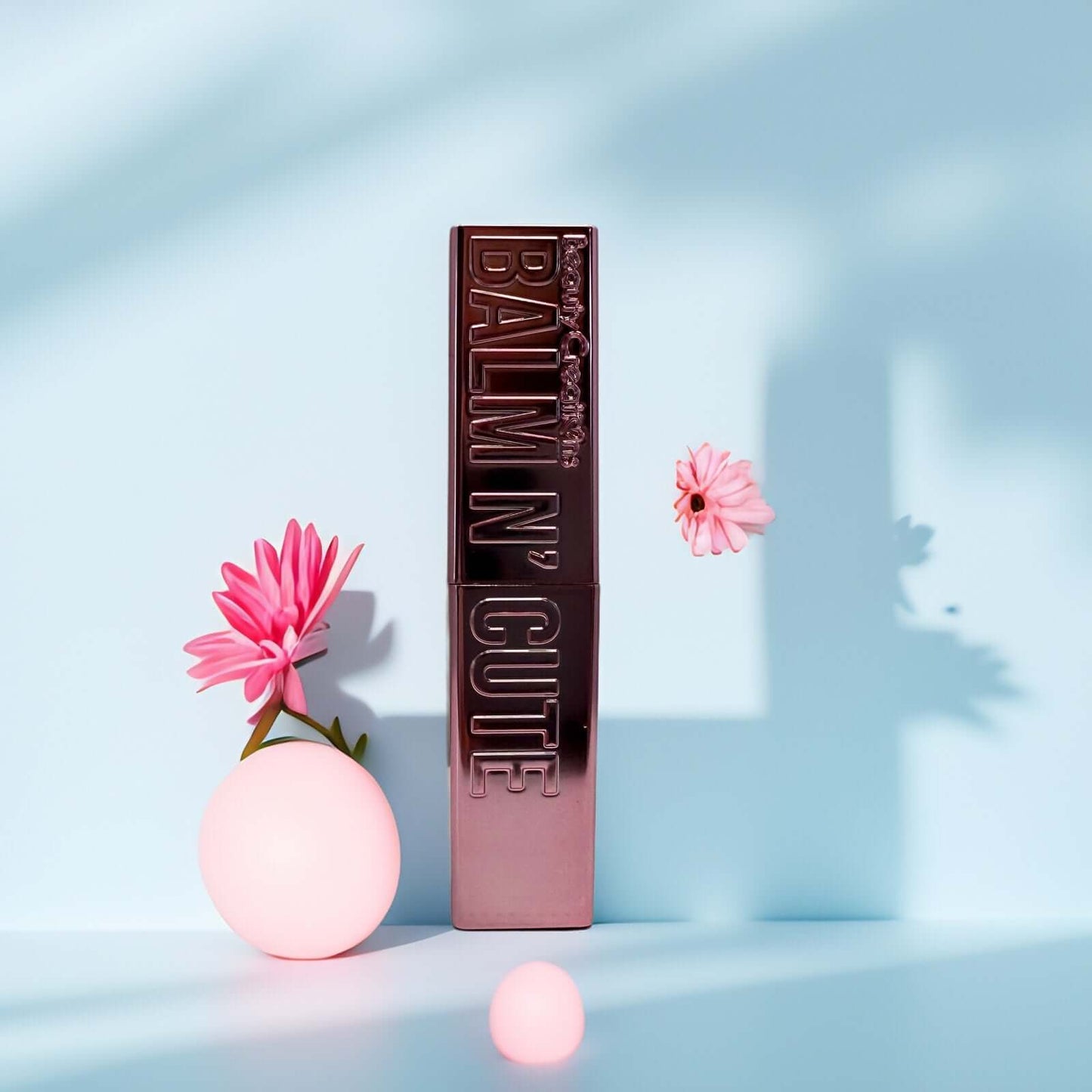 Beauty Creations Balm N’ Cute Tinted Lip Balm Trio with flowers.
