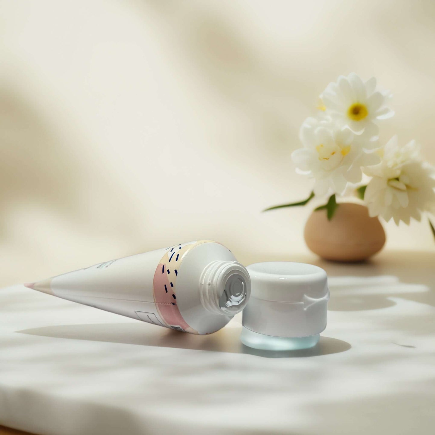 Glowfox Firm & Smooth Retinol Collagen cream on table.