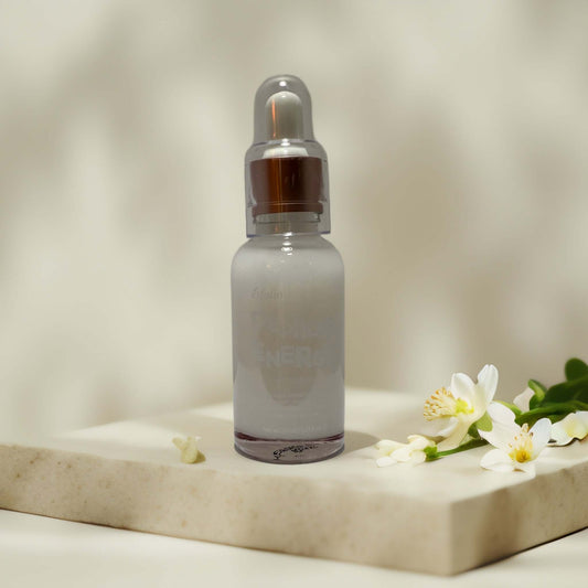 Esfolio Peptide Energy Ampoule bottle with floral accents