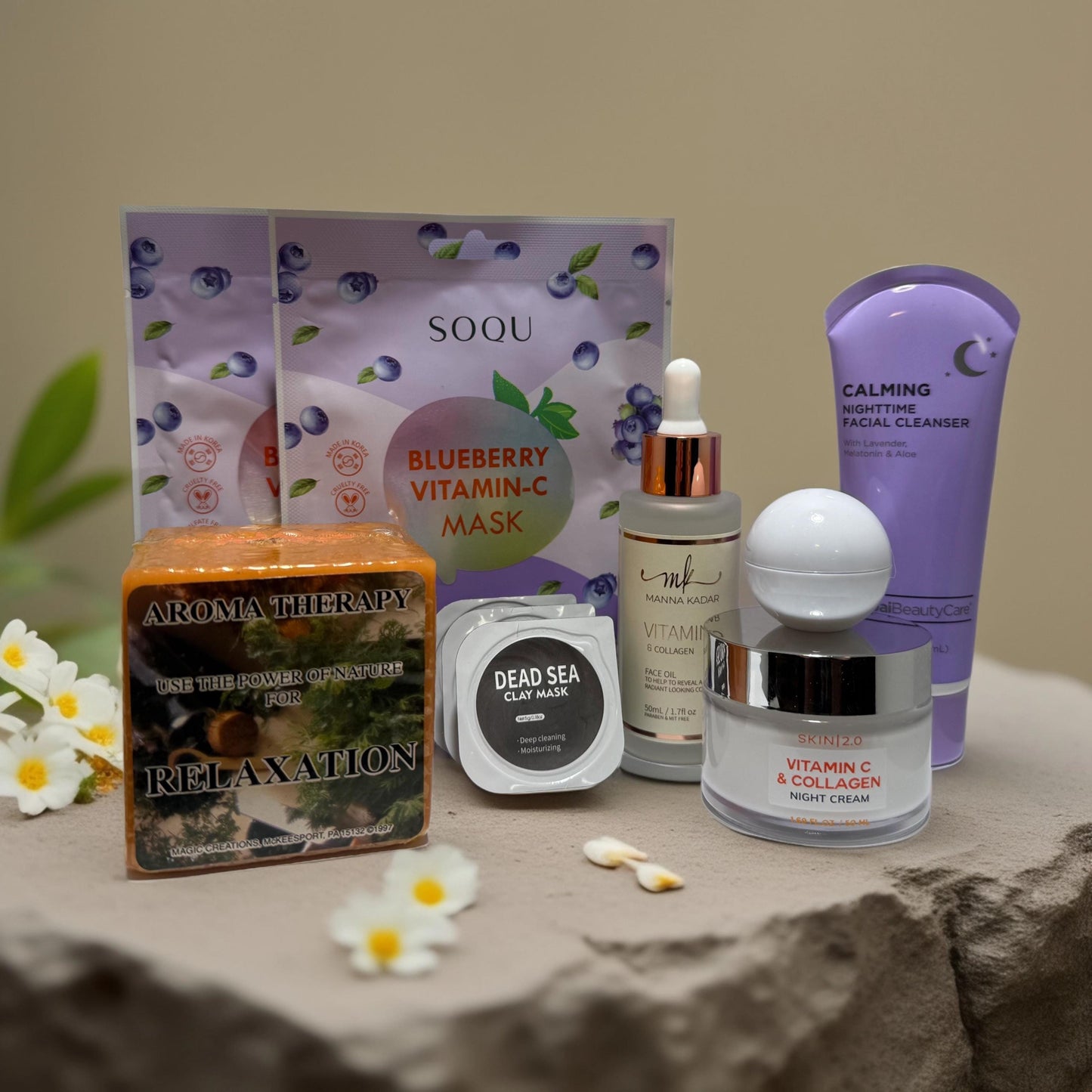 One of a Kind Curated Gift Box with a Handmade Skincare Product by Queen City Skincare including masks and creams.