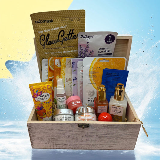 One of a Kind Curated Gift Box with a Handmade Skincare Product by Queen City Skincare, featuring various skincare items.