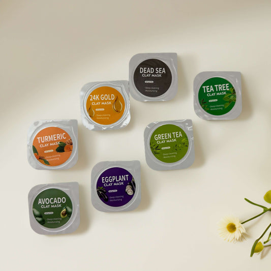 Assorted Pore Detox clay masks including turmeric, avocado, green tea, and more for targeted skin treatment.