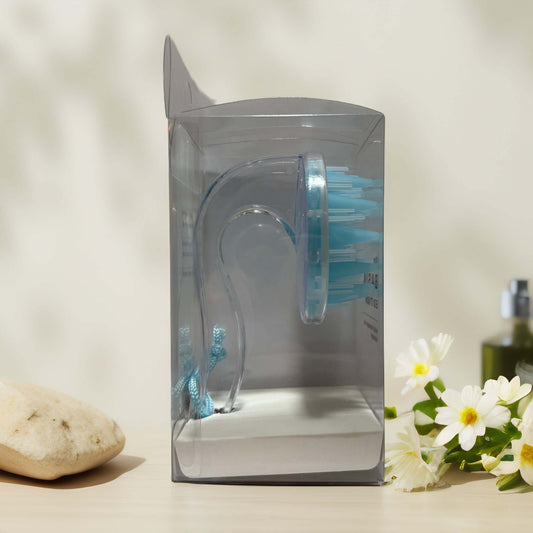 Soothing Scalp Massage Brush in packaging by Conair.
