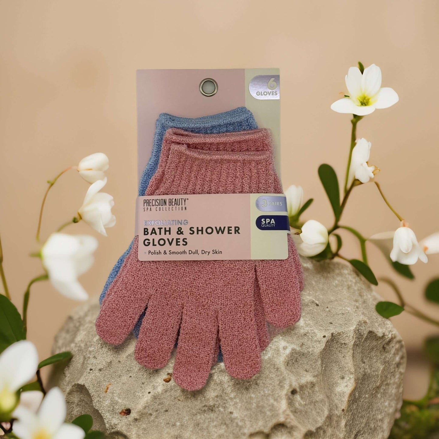 Spa exfoliating bath and shower gloves in assorted colors for polishing and smoothing dry skin.