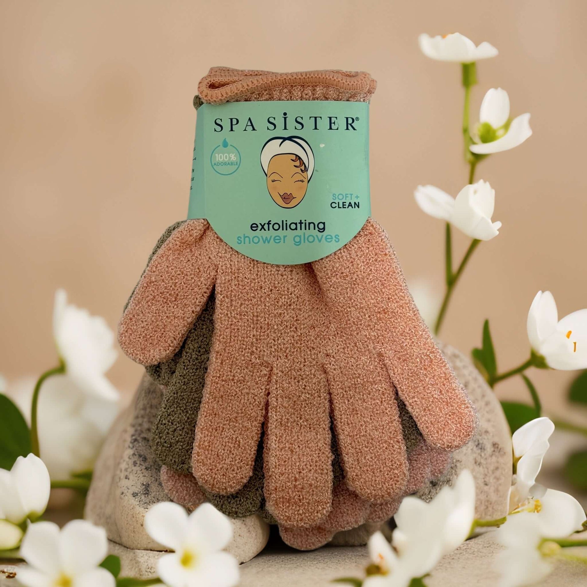 Spa exfoliating shower gloves in assorted colors with packaging, ideal for full-body exfoliation and cleansing.